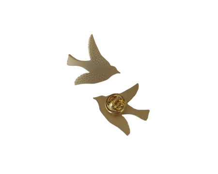 Pin's oiseau en laiton doré