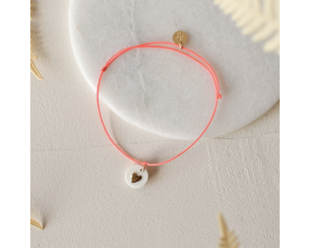 Bracelet médaillon coeur fil rose fluo BAUBELS